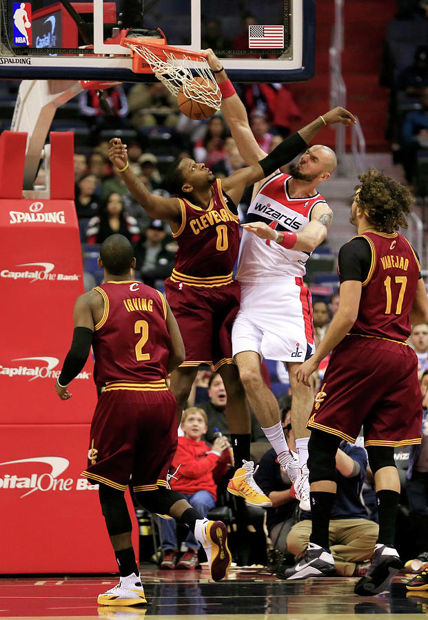 C.j. Miles and Marcin Gortat Photograph by Rob Carr