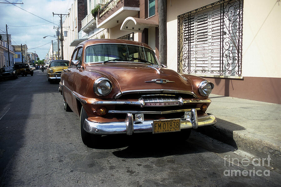 Classic 1950s Plymouth in Santiago Cuba Photograph by James Brunker