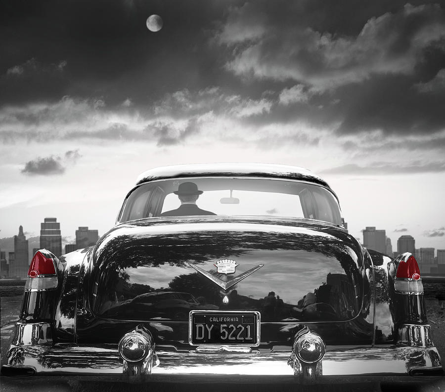 Vintage Black Cadillac Fleetwood And City Skyline Photograph by Larry Butterworth