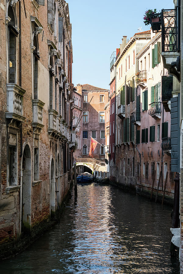Classic Venetian - Republic of Venice Flag of Saint Mark over a Bridge in a Side Canal Photograph by Georgia Mizuleva