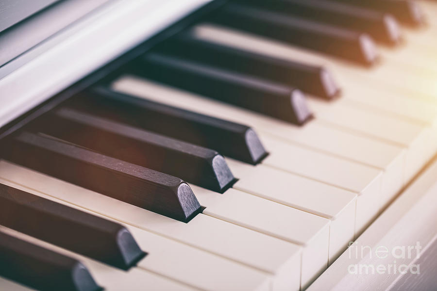 Classic white piano keyboard Photograph by Michal Bednarek