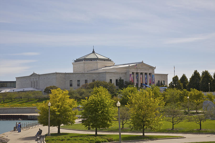 Classical public building viewed above park. Photograph by Barry Winiker