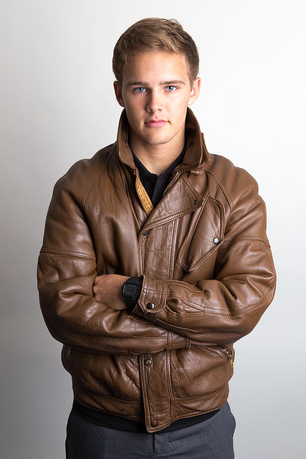 Clean cut teen youth in leather jacket Photograph by GSO Images