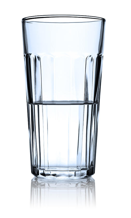 Clear Glass Half Full of Water Isolated with Reflection Photograph by Ryasick