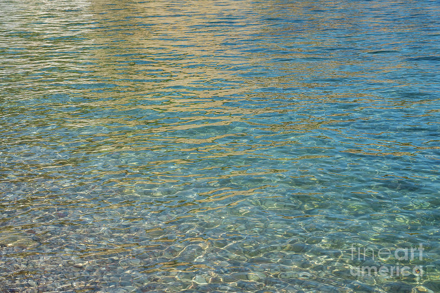 Clear sea water and reflections on the beach Photograph by Adriana Mueller