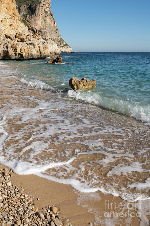 Clear Sea Water And Waves On The Beach Photograph