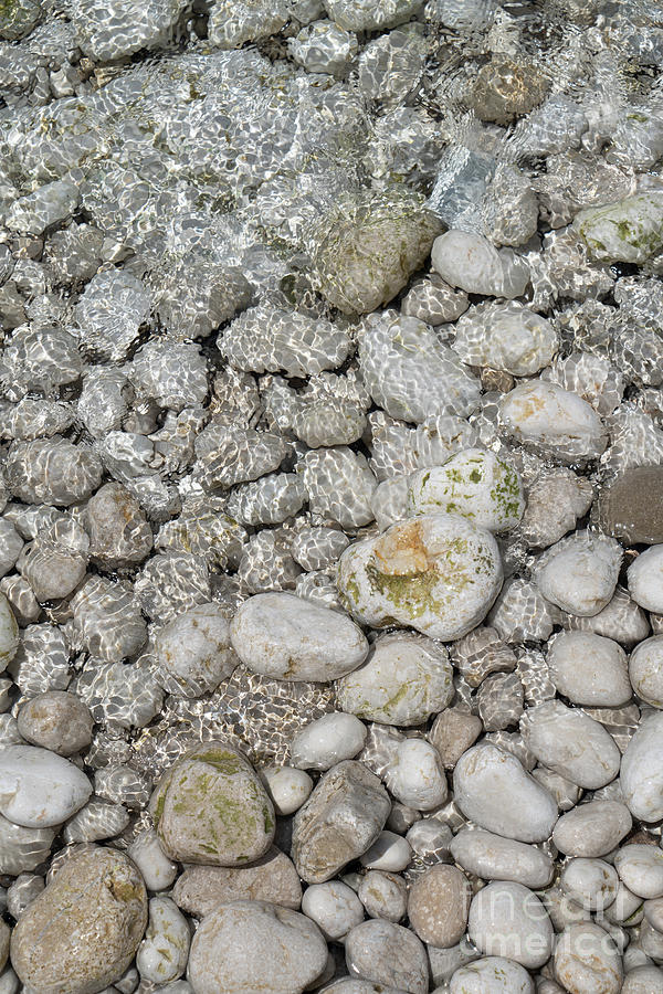 Clear sea water flowing over white stones 1 Photograph by Adriana Mueller