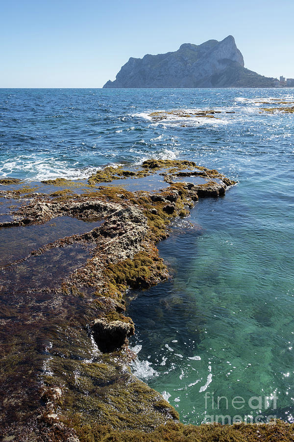 Clear water and the Penon de Ifach in Calpe Photograph by Adriana Mueller