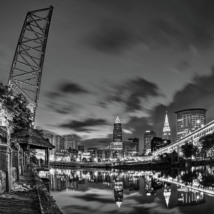 Cleveland Skyline And Cuyahoga River Bridge At Dawn - Black and White Photograph by Gregory Ballos