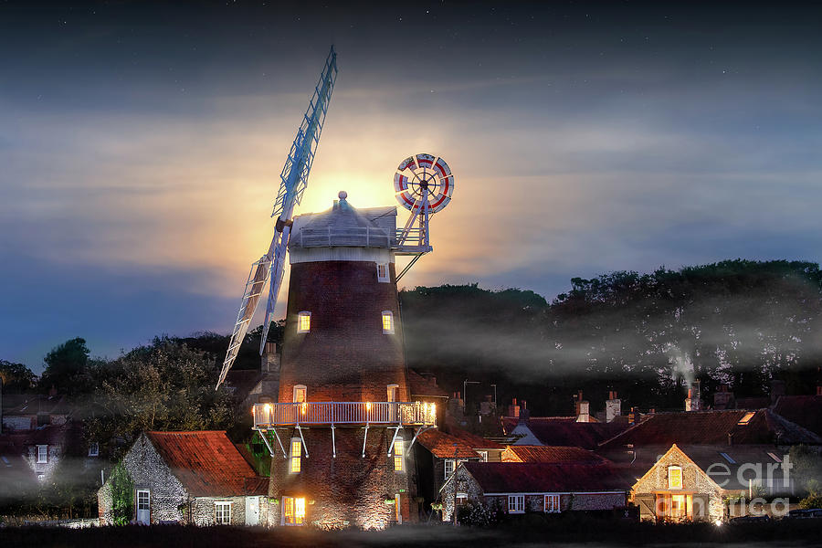 Cley windmill twilight with full moon in Norfolk Photograph by Simon Bratt