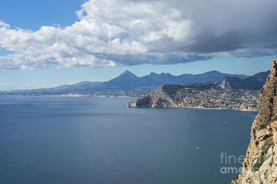 Cliffs, clouds and the blue Mediterranean Sea Photograph by Adriana Mueller