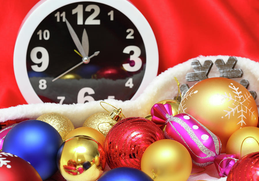 Clock and christmas balls and toys Photograph by Mikhail Kokhanchikov