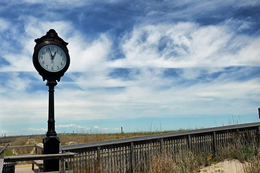 Clock on the Bethany Beach Boardwalk  Photograph by Bill Swartwout