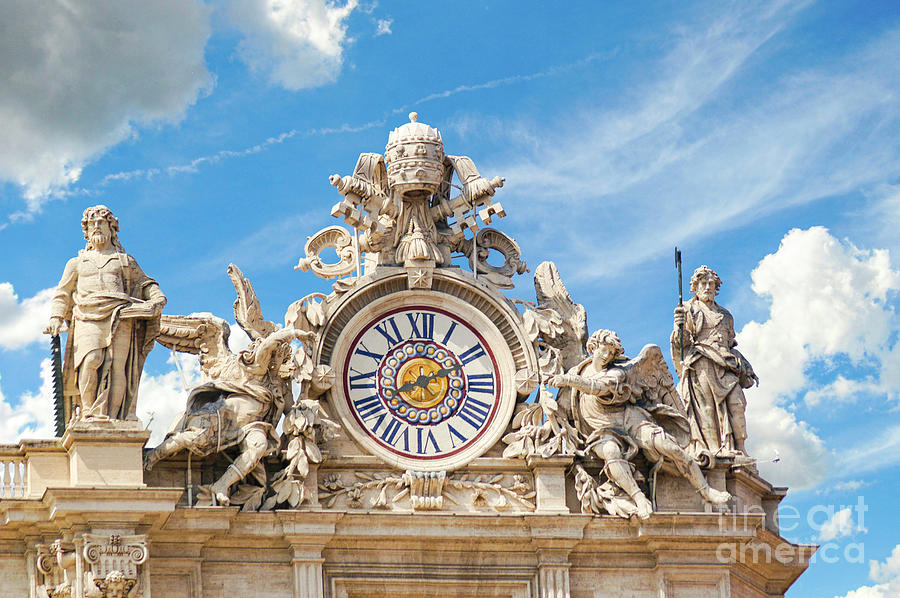 Clock on top of St. Peters Basilica in Rome, Italy.  Photograph by Gunther Allen