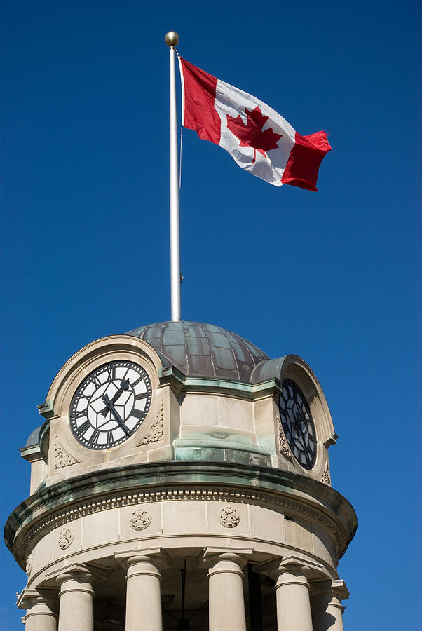 Clock Tower and Flag Photograph by SimplyCreativePhotography