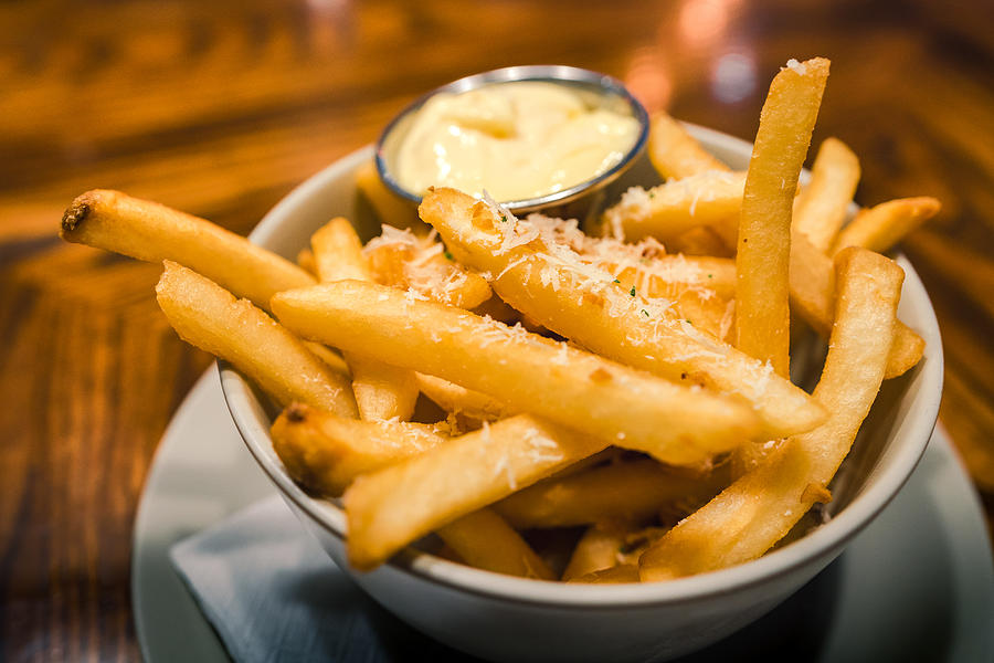 Close-up bowl of french fries with mayonnaise dipping Photograph by Theerawat Kaiphanlert