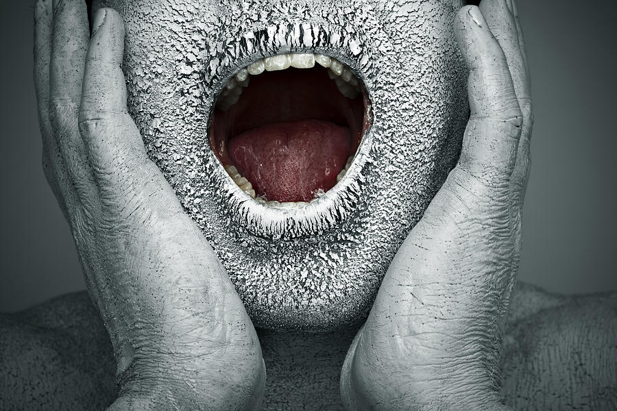 Close-up, chapped, dry painted human face screaming with open mouth Photograph by Gawrav