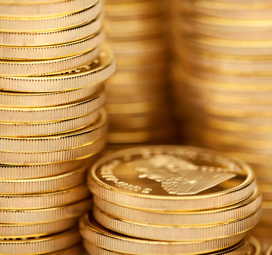 Close up image of stacks of gold coins Photograph by Anthony Bradshaw