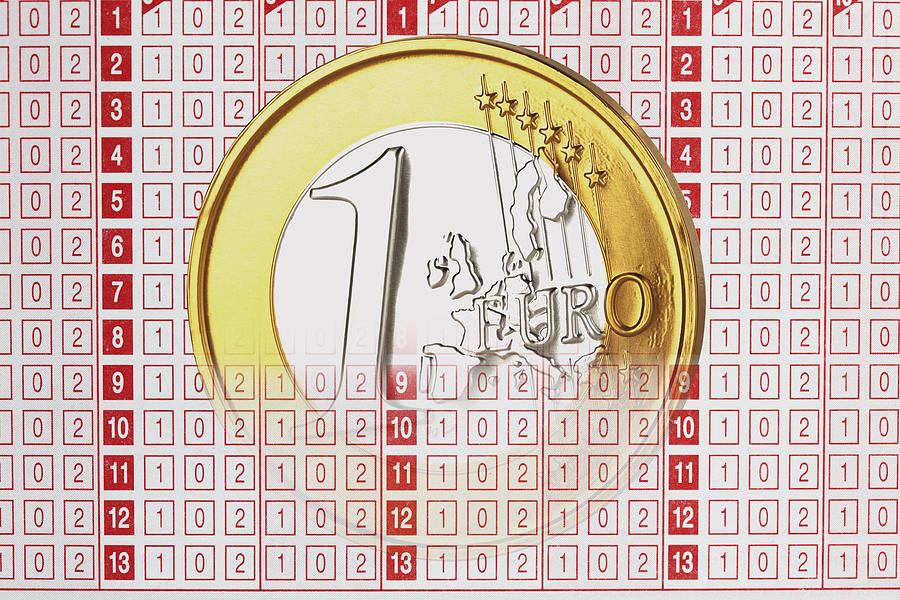 Close up of 1 euro coin on betting slip Photograph by Tuned_In