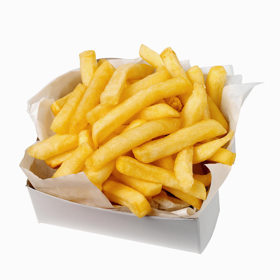 Close-up of a carton of french-fries Photograph by Ciaran Griffin