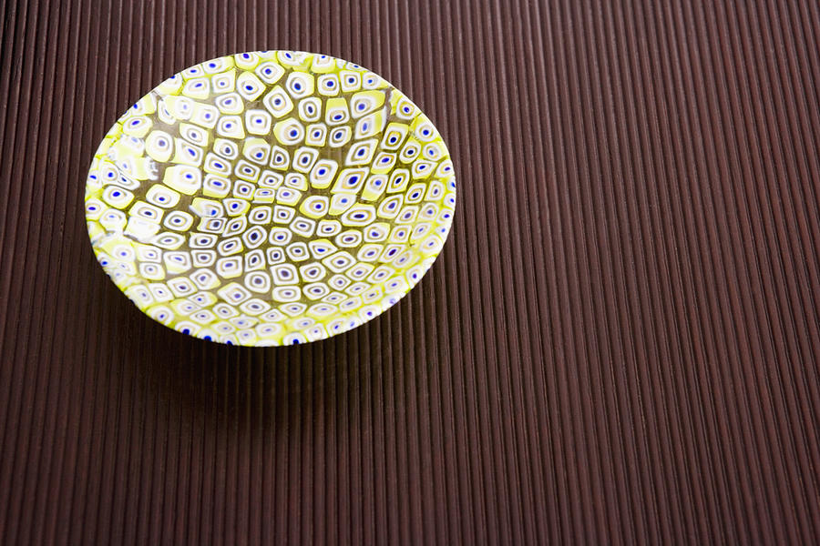 Close-up of a ceramic bowl on a table Photograph by Glowimages