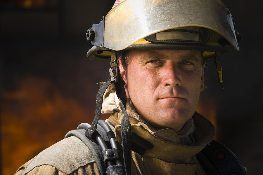Close-up of a firefighter Photograph by Rubberball/Mike Kemp