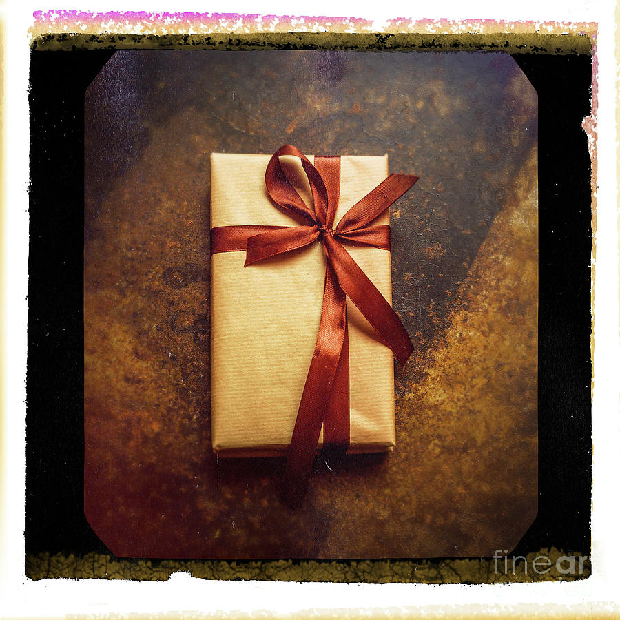 Christmas Photograph - Close-up of a gift parcel by Bernard Jaubert