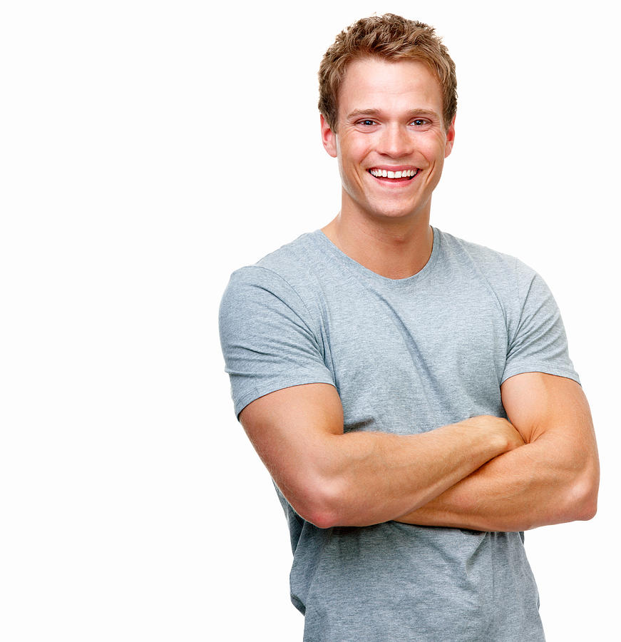 Close-up of a handsome young man smiling against white background Photograph by Jacob Wackerhausen