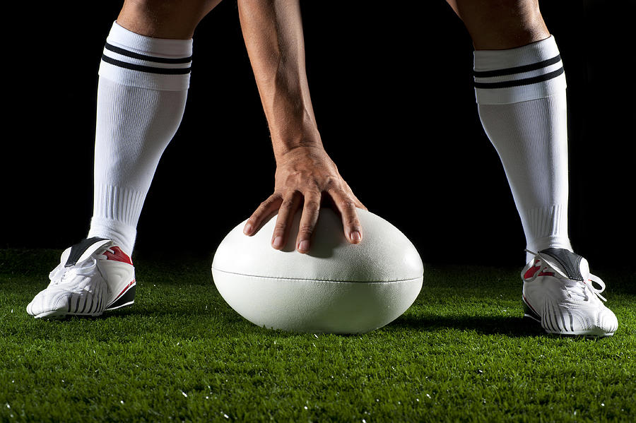 Close up of a man playing rugby ball Photograph by Courtneyk