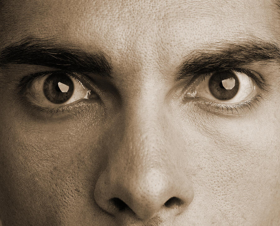 Close-up Of A Persons Eyes Wide Open (sepia) Photograph by Stockbyte