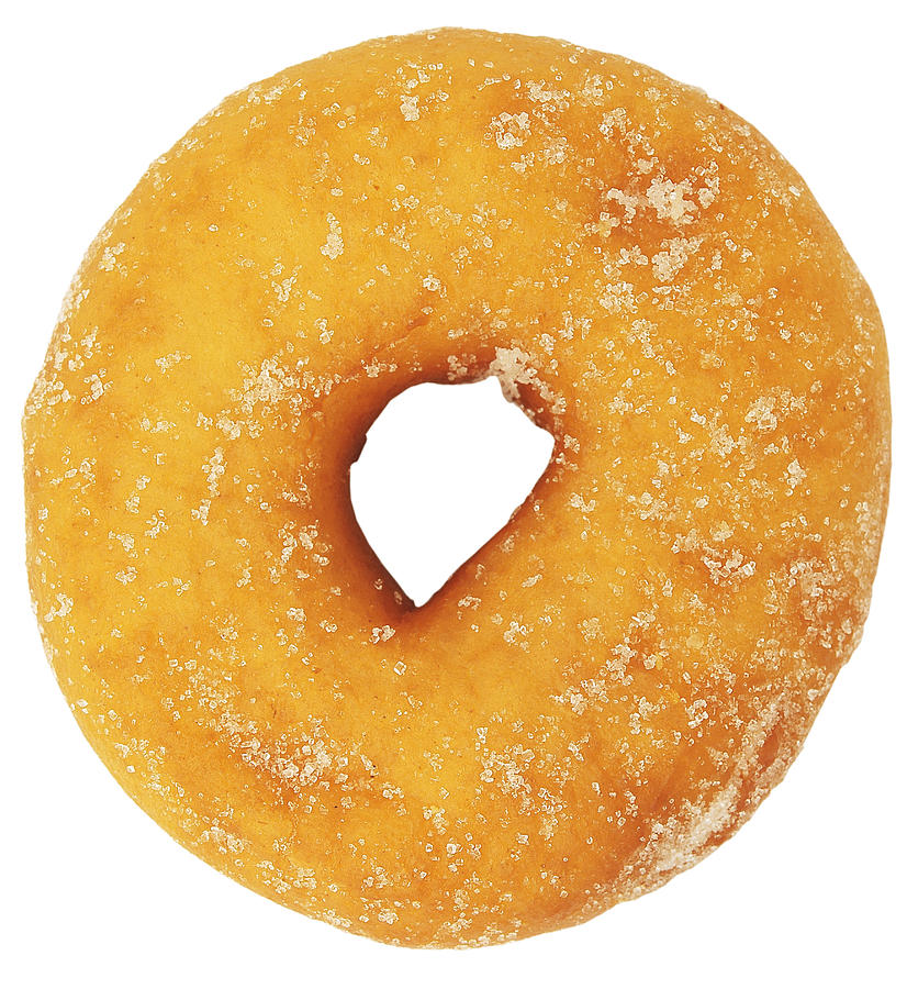 Close-up Of A Sugar Coated Doughnut Photograph by Stockbyte
