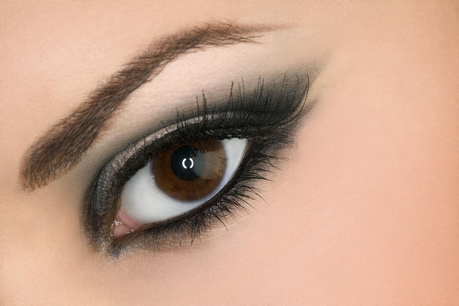 Close-up of a womans open eye with make-up and mascara looking at the viewer. Photograph by Thinkstock