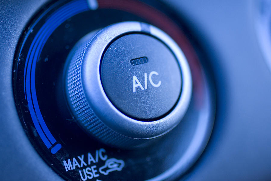 Close up of air conditioning button in a car Photograph by MarkCoffeyPhoto