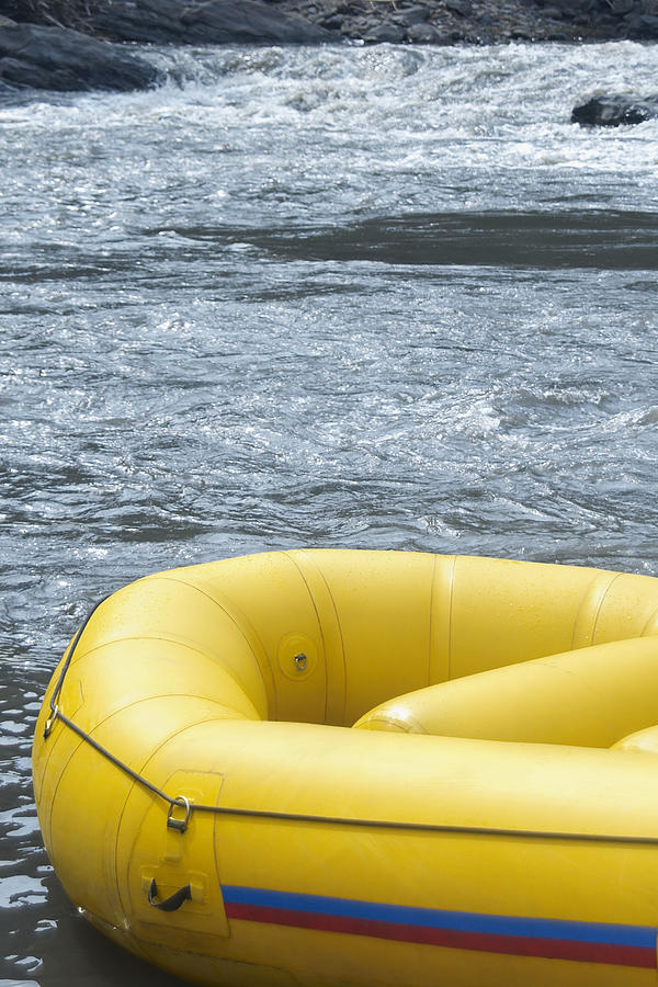 Close-up of an inflatable raft in a river Photograph by Glowimages