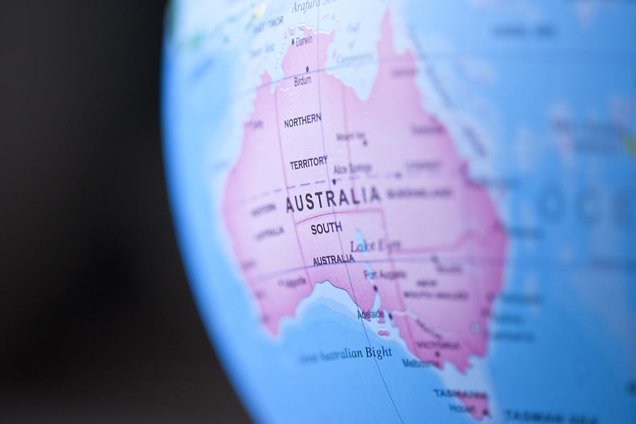Close-up of Australia on globe Photograph by Jenny Dettrick