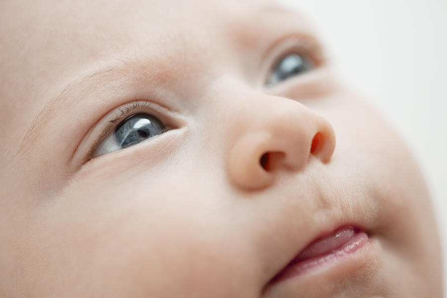 Close up of babies face Photograph by Kelvin Murray