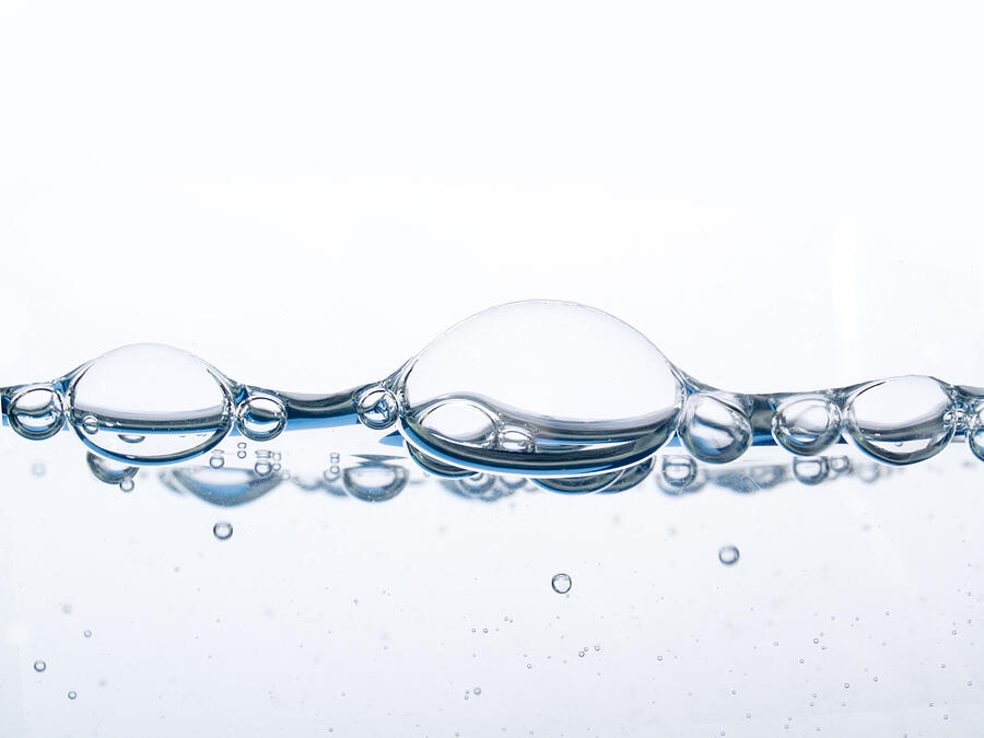 Close-up of bubbles on water isolated on white Photograph by Portishead1