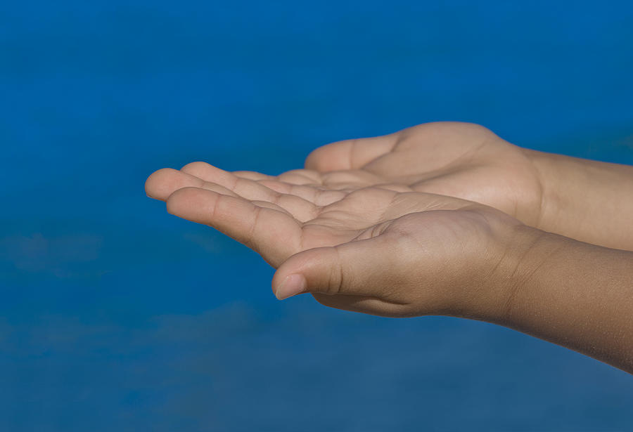 Close-up of childs hands held up Photograph by Paolo Negri