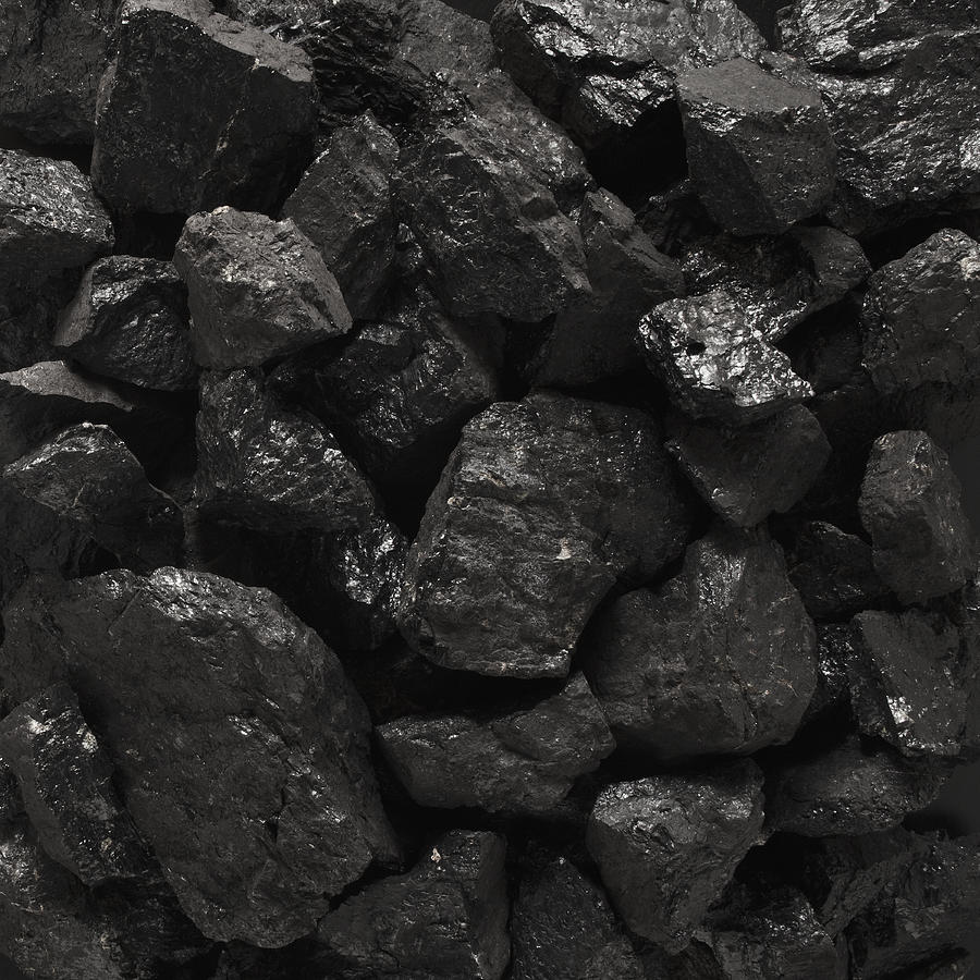 Close-up of coal Photograph by Mike Kemp