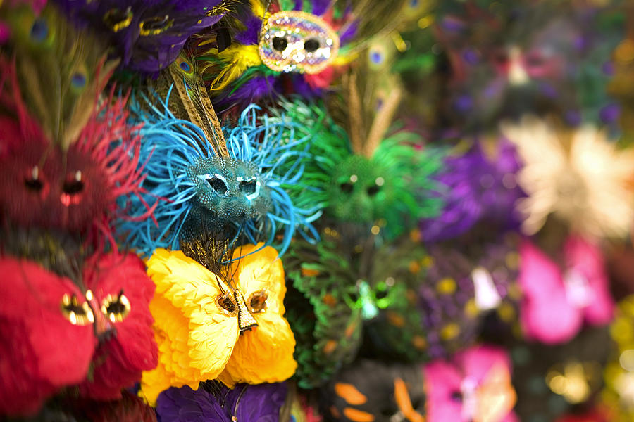 Close-up of colorful miniature masks in a New Orleans souvenier shop. Photograph by Thinkstock