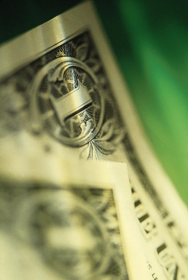 Close-up of dollar bills Photograph by Comstock
