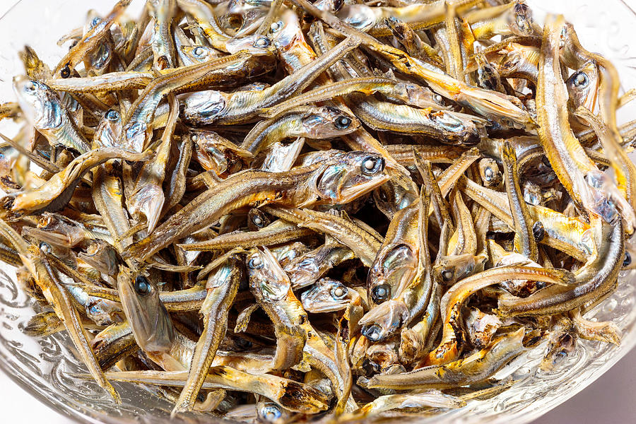 Close up of dried sardines used as seasoning in Japanese foods and cooking. Japanese healthy snack food. Niboshi or Iriko fish. Photograph by Shootdiem
