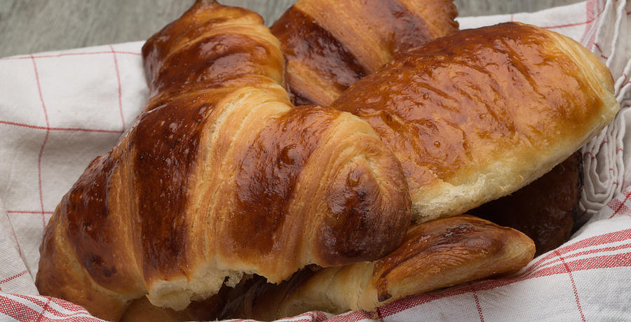 Close up of freshly baked croissants home made Photograph by Jean-Marc PAYET