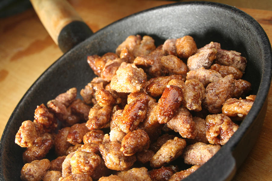 Close up of fried almonds on a flying pan Photograph by Dirkr