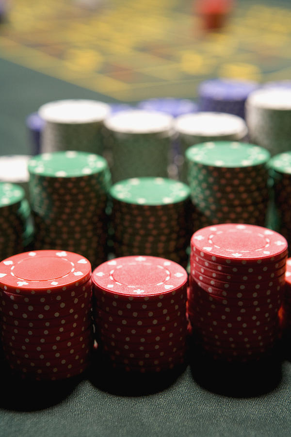 Close up of gambling chips Photograph by Simon Webb and Duncan Nicholls