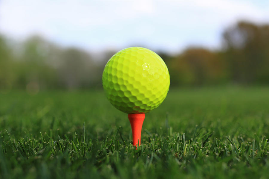 Close-up of golf Ball on a driving tee Photograph by Douglas Sacha