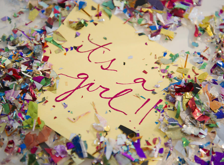 Close up of greeting card with confetti Photograph by Jamie Grill