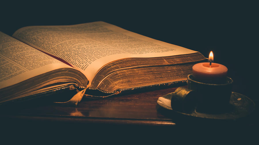 Close-Up Of Lit Candle And Bible On Table In Darkroom Photograph by Yuri Nunes / EyeEm Close-Up Of Lit Candle And Bible On Table In Darkroom Photograph by Yuri Nunes / EyeEm