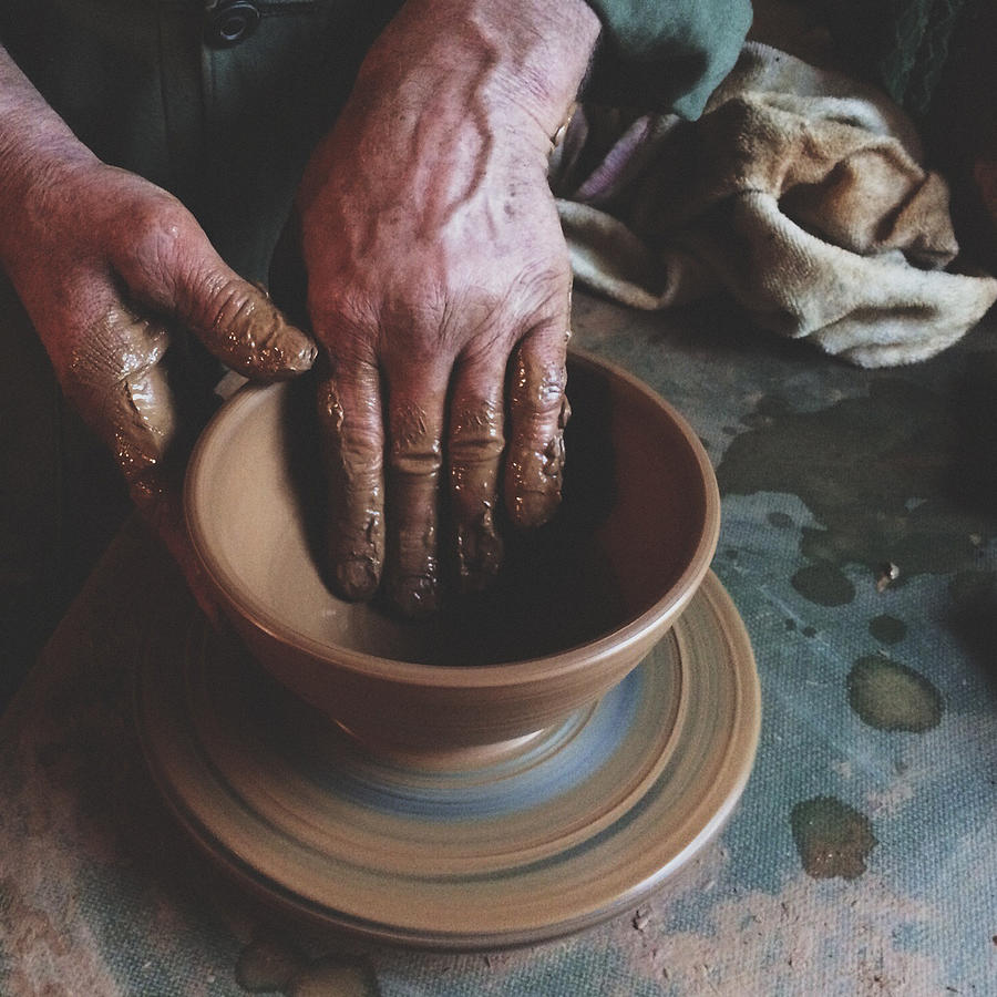 Close-up of man making pottery Photograph by Foxline