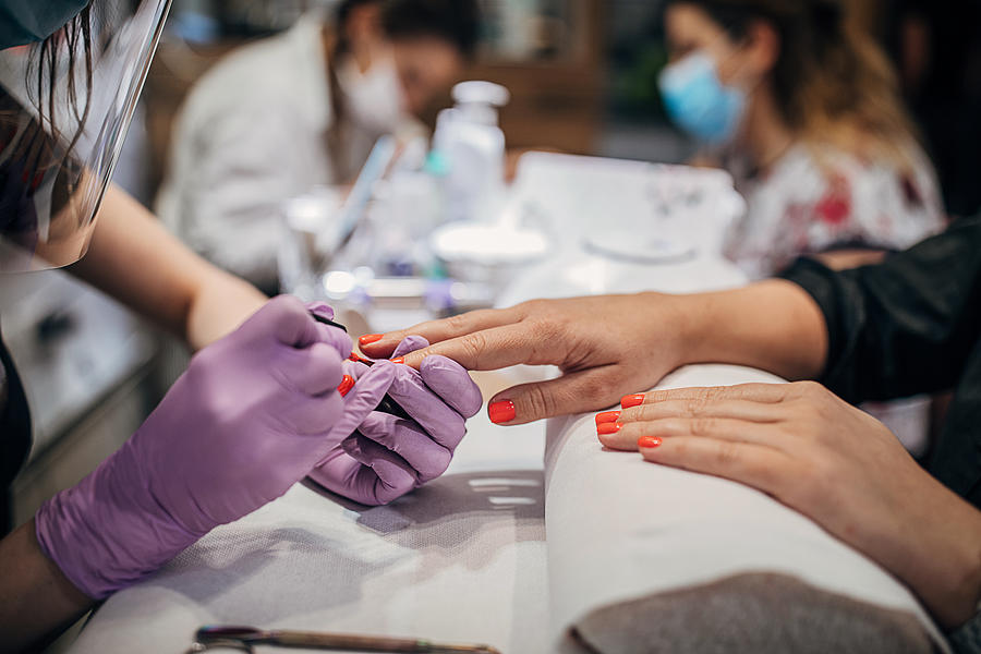 Close up of manicure treatment in beauty salon Photograph by South_agency